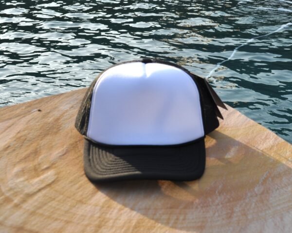 Black front with black mesh foam trucker hat Black front with black mesh foam trucker hat