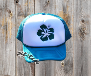 Hibiscus embroidered flower on a foam trucker hat Hibiscus embroidered flower on a foam trucker hat