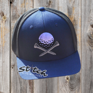Golf ball and tees on a trucker hat