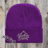 Purple beanie with adventure awaits embroidered on it