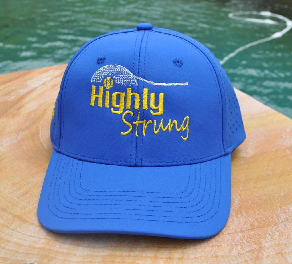 Highly Strung Tennis baseball cap in bright blue.