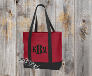 Red and black large blank canvas bag with monogram on the front