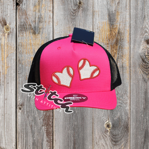 Double heart design with red and white on pink hat Double heart design with red and white on pink hat