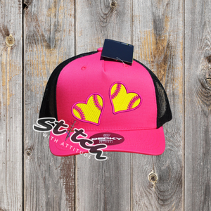 Double heart design with yellow and pink on pink hat