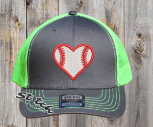 Single heart design with white and red on a gray and green hat
