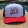 Design of Free to Sparkle on a patriotic red white and blue hat