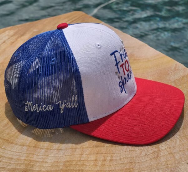 Design of Free to Sparkle on a patriotic red white and blue hat side view