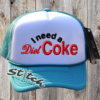 I need a diet soda on a teal and white hat