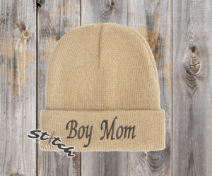 Tan with the embroidery on the front