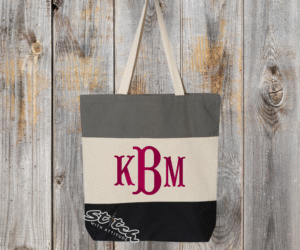 Black and gray tricolor canvas bag with monogram on the front Black and gray tricolor canvas bag with monogram on the front