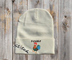 F-caw-F chicken design on a cream beanie