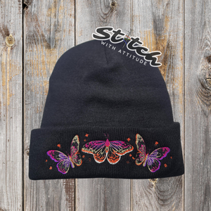 Embroidered butterflies on a black beanie