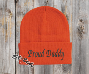 Orange beanie with the embroidery on the front