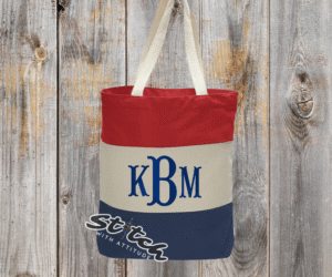 Red and Blue tricolor canvas bag with monogram on the front Red and Blue tricolor canvas bag with monogram on the front