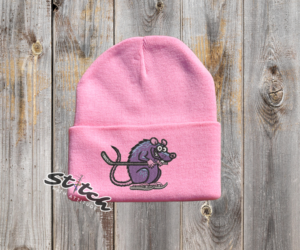 Funny hockey rat embroidered on a light pink beanie