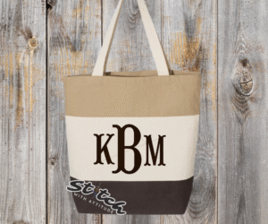 Chocolate tricolor canvas bag with monogram on the front Chocolate tricolor canvas bag with monogram on the front