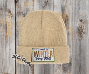 Tan beanie with I don't do Winter very well design