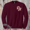 Daddy Hack logo embroidered on a maroon crewneck sweatshirt Daddy Hack logo embroidered on a maroon crewneck sweatshirt