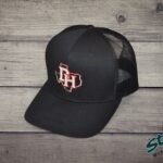 Daddy Hack open Texas design embroidered on black trucker hat, angled view