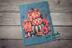 Stacked Pumpkins Fall Tee with Rhinestone Accents - Stacked-Pumpkins-Rhinestone-Tee-0.jpg Stacked Pumpkins Fall Tee with Rhinestone Accents. Three painted pumpkins under a gingham bow, with mushrooms, sunflowers and stars, and real rhinestones set by hand across the des