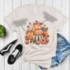Stacked Pumpkins Fall Tee with Rhinestone Accents - Stacked-Pumpkins-Rhinestone-Tee-4.jpg Stacked Pumpkins Fall Tee with Rhinestone Accents. Three painted pumpkins under a gingham bow, with mushrooms, sunflowers and stars, and real rhinestones set by hand across the des