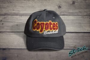 Double Glitter Mascot Dad Hat - Double-Glitter-Mascot-Dad-Hat-01.jpg Double Glitter Mascot Dad Hat. Your mascot name in two layers of glitter, one color outlining the other, with a script line underneath. Shown as Coyotes Baseball in gold and maroon
